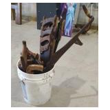 Bucket of Vintage Handsaws