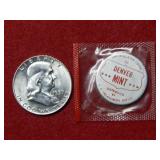 1959 D Franklin Half with mint tag and rim damage