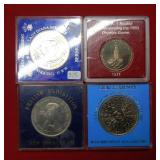 Four Foreign Coins in holders