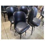 Four black bar stools; extra seat
