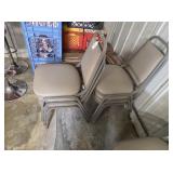 Eight stacking chairs