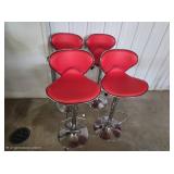 Four red bar stools
