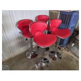 Four red bar stools