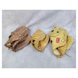 3 baseball gloves