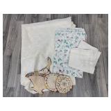 tablecloths; knitted basket and hot pads