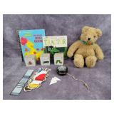 Books, teddy bear, paper doll