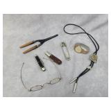 Vintage eye glasses, curling iron, pocket knives
