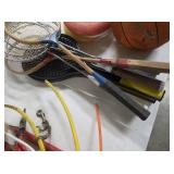 Assorted raquets/frisbees
