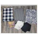 3 sets of placemats; aprons; hand towels