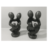 Two Stone Family Sculptures