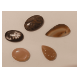 Five Polished Gemstone Cabochons