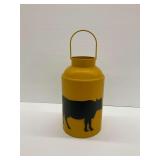Milk Can Repurposed as a Decorative Piece with Cow Silhouette Painted on Side