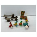 Three Wooden Pull Toys with Winchester Roller Skates