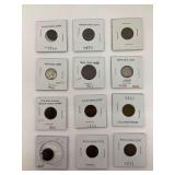 Twelve United States Coins Including Indian Head Cents and Mercury Dimes