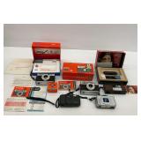 Cameras Group with Boxes and Paperwork