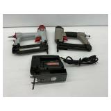 Two Pneumatic Staple Guns and Craftsman Saber Saw