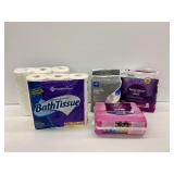 Three Sealed Packages of Personal Care and Paper Products