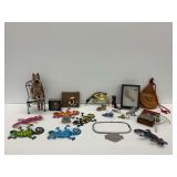 Decorative Group of Items Including Figurines and Musical Instrument