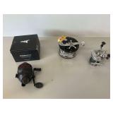 Three Fishing Reels with KastKing Box