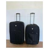 Two Travelers Club Rolling Suitcases