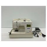 White Model 2999 Sewing Machine with Accessories...powers on