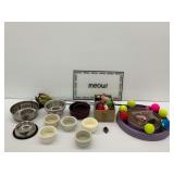 Pet Supplies Including Various Bowls and Toys