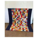 Patchwork Quilt with Multi-Colored Squares