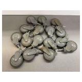 Sixteen 4 in. Gray Swivel Casters
