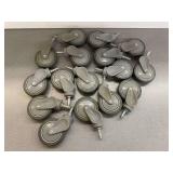 Sixteen 4 in. Gray Swivel Casters