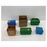Reloading Supplies with Cartridge Cases and Storage Boxes