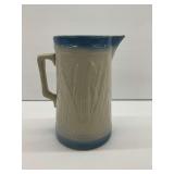 Stoneware Pitcher with Blue Trim and Relief Pattern