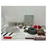 Variety of Kitchen Utensils and Glassware
