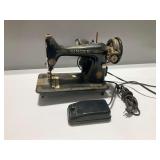 Vintage Singer Electric Sewing Machine ... does not power on and needs cleaning
