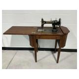 White Rotary Sewing Machine in Wooden Cabinet