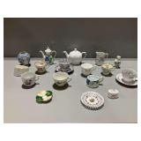 Porcelain Teapots, Cups, and Saucers
