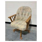 Rolling Chair with Tufted Upholstery and Wooden Frame