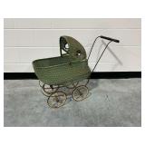 Green Wicker Doll Buggy with Iron Wheels