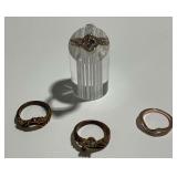 (4) Sterling Silver Rings... ring on stand is size 6