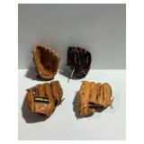 (4) Baseball Gloves Including Wilson and Spalding and Franklin