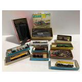 HO Scale Model Train with Locomotives, Rolling Stock, Tracks, and Building Kit