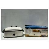 Rival 16 Quart Roaster Oven with Buffet Server...powers on