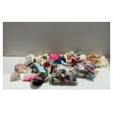 Assortment of Doll Clothes and Shoes