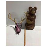 Taxidermy and Carved Decor: Deer Skull and Wooden Bear