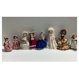 (8) Bradley Dolls with Fabric Costumes and Stands