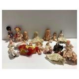 Assorted Dolls with Various Costumes and Materials