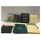 Empty Scrapbooks, Photo Albums, and Construction Paper