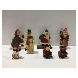 Christmas Figurines Including Wooden Santa and Snowman Sculptures
