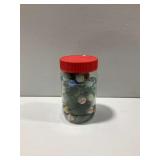 Glass Marbles in Plastic Jar