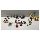 Group of Plastic Character Figurines... Simpsons, Smurfs, California Raisins