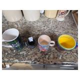 Four Assorted Ceramic Mugs